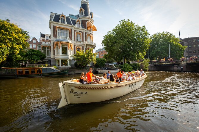 Amsterdam Canal Cruise With Live Guide and Onboard Bar - Inclusions and Amenities