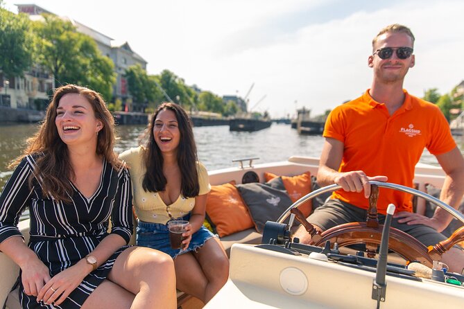 Amsterdam Canal Cruise With Live Guide and Onboard Bar - Confirmation and Booking Policies