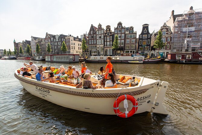 Amsterdam Canal Cruise With Live Guide and Onboard Bar - Weather Dependence and Considerations