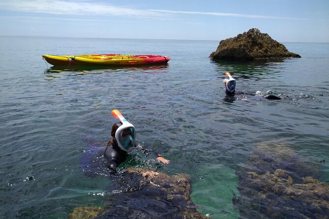 Kayak Adventure: Cliff Jumping, Sea Caves, Snorkeling and Lunch - Kayaking the Stunning Coastline