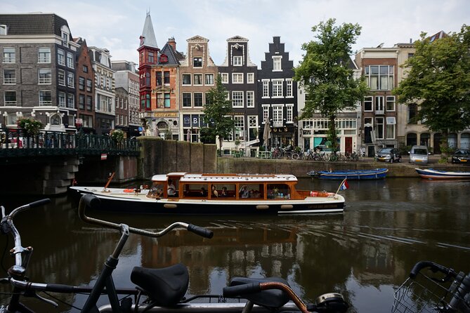 Amsterdam Morning Canal Cruise With Coffee and Tea - Boat With Open-Air Sundeck