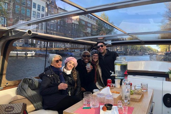 Amsterdam Small-Group Canal Cruise Including Snacks and Drinks - Meeting Point and Pickup