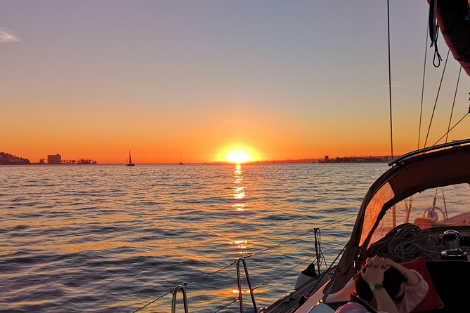 Lisbon Sunset Sailing Tour on Luxury Sailing Yacht With 2 Drinks - Meeting Point and Pickup