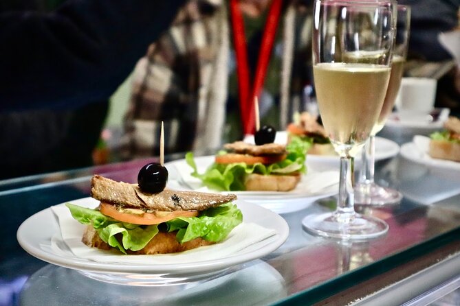 Lisbon Walking Food Tour: Tapas and Wine With Secret Food Tours - Meeting and Pickup