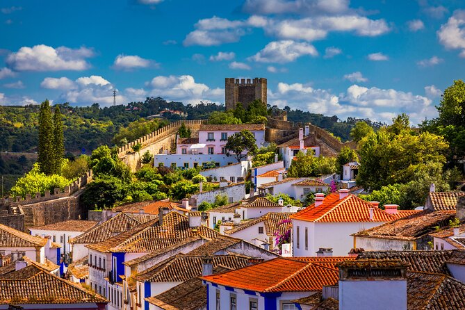 Three Cities in One Day: Porto, Nazare and Obidos From Lisbon - Included Attractions