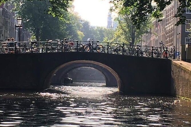 Amsterdam Private Canal Cruise With Live Guide and Drinks - Included Amenities