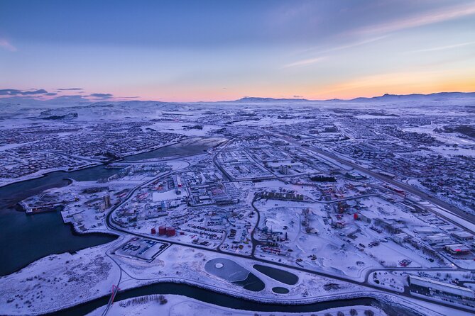 Helicopter Tour With Mountain Summit Landing From Reykjavik - Meeting and Pickup