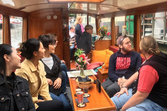 Amsterdam Morning Canal Cruise With Coffee and Tea - Cozy Atmosphere With Snacks