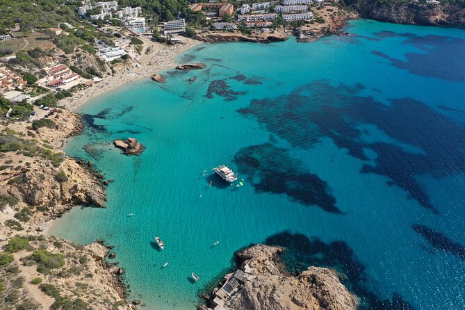 Ibiza Beach Hopping Cruise With Paddleboards, Drinks and Food. 6h - Cancellation Policy
