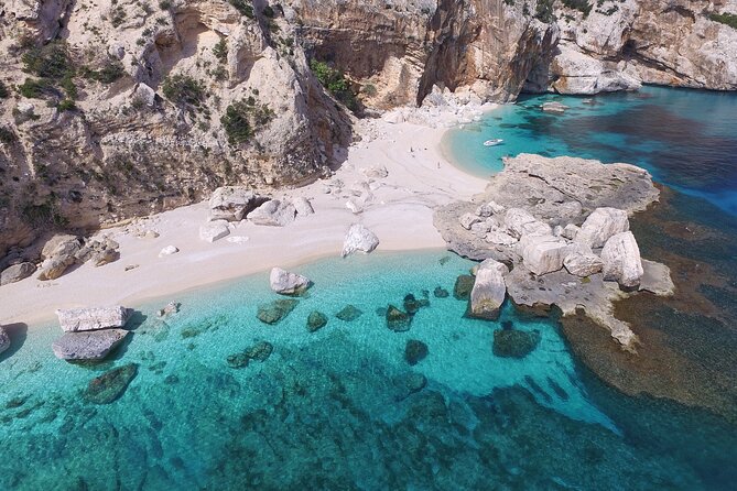 One Day Guided Boat Tour Along the Baunei Coast - Meeting and Pickup