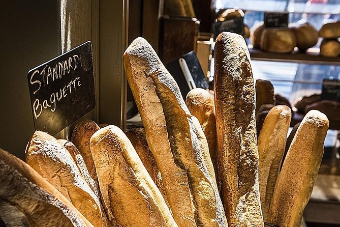 Paris Montmartre Walking Tour Best Art Culture and Food - Taking in Neighborhood Charm