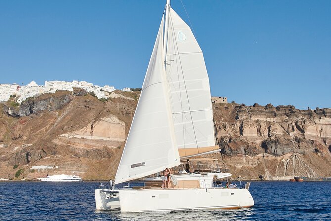 Santorini Gold Catamaran Cruise With Bbq, Drinks and Hotel Pickup - Cancellation Policy