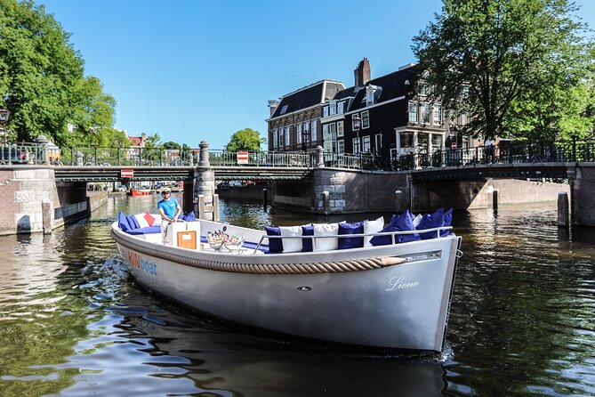 Amsterdam Canal Cruise in Open Boat With Local Skipper-Guide - Cancellation and Refund Policy