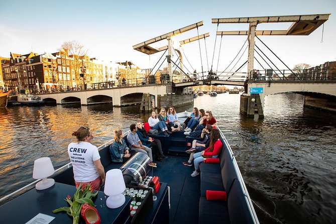 Amsterdam Canal Cruise With Live Guide and Unlimited Drinks - Boat and Tour Specifications