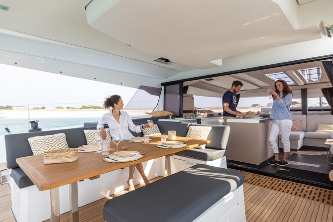 Semi-Private Brand-New Catamaran Cruise in Mykonos With Meal, Drinks & Transport - Explore Uninhabited Rhenia Island