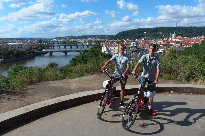 Prague E-scooter Sightseeing Small Group or Private Tour & Free Taxi Pick Up - Helmet, Raincoat, and Gloves