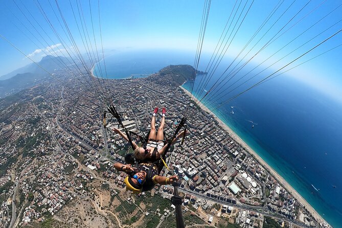 Tandem Paragliding in Alanya, Antalya Turkey With a Licensed Guide - Landing on Kleopatra Beach