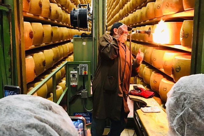 Bologna Food Experience: Factory Tours & Family-Style Lunch - Prosciutto Production Demonstration