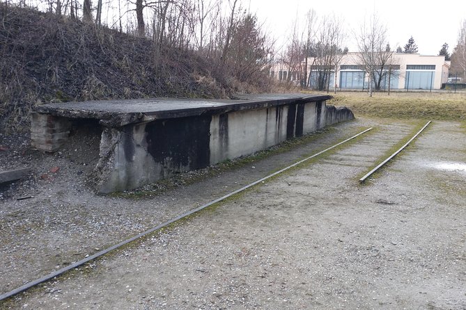 Guided Dachau Concentration Camp Memorial Site Tour With Train From Munich - Accessibility and Weather