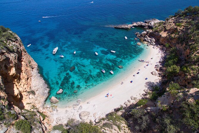 One Day Guided Boat Tour Along the Baunei Coast - Swimming and Snorkeling