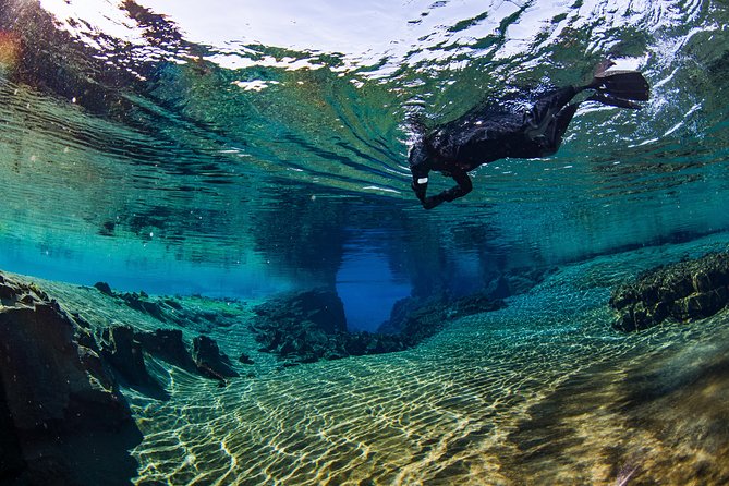 Silfra: Snorkeling Between Tectonic Plates Pick up From Reykjavik - Cancellation and Weather Policies