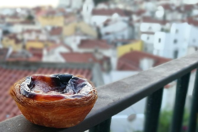 Lisbon Small-Group Food Tour With 18 Tastings in Alfama District - Meeting Point and Group Size