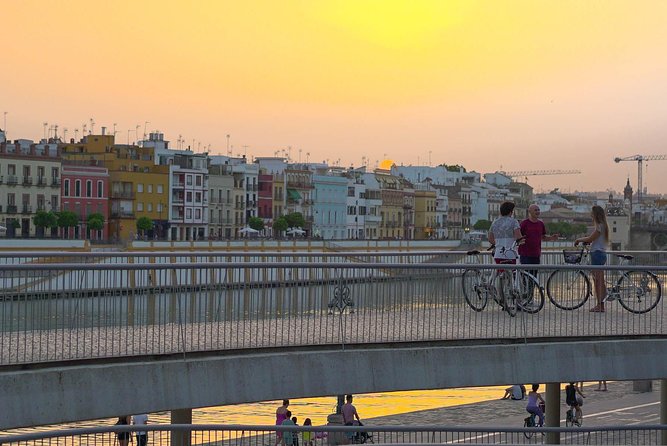 Sunset Guided Bike Tour in Seville - Exploring Neighborhoods by Bike