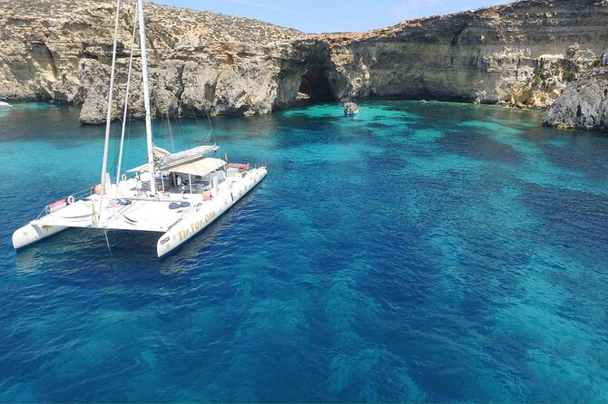 Full-Day Catamaran Cruise With Lunch in Island of Malta - Key Points