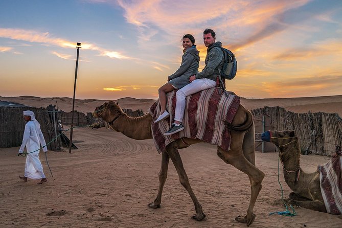 Dubai Evening Desert Safari, Camel Ride, Sandboarding & BBQ Dinner