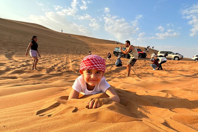 Dubai: Red Dunes, Sandsurf, Camel Ride, BBQ Dinner at Desert Camp - Thrilling Dune Bashing Experience