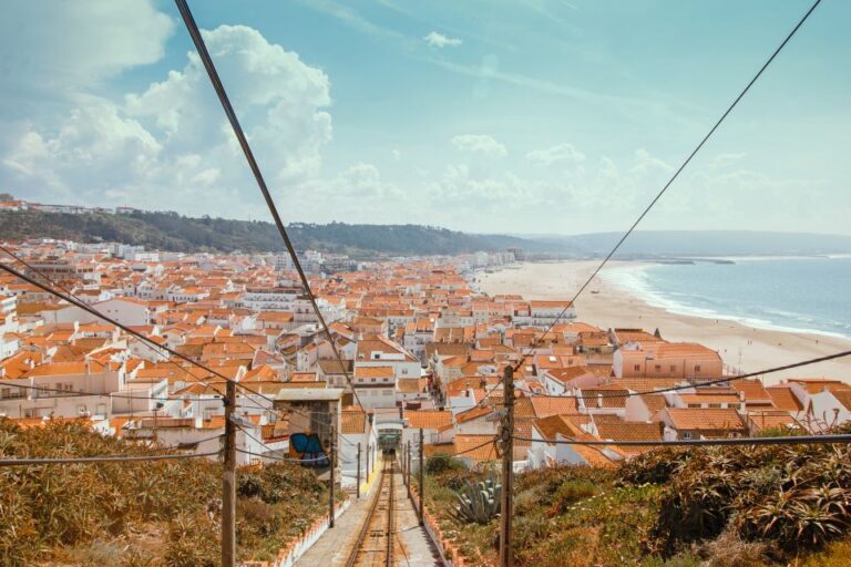 From Porto: Private Transfer to Lisbon With Stop at Nazaré