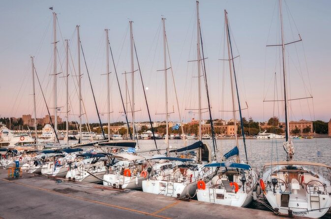 Greek Shores Snorkel and Sailing Day Trip With Lunch - Location and Duration