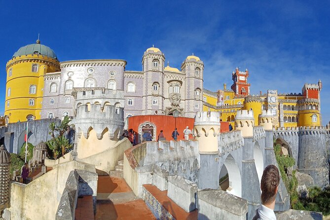Group to Pena Palace, Sintra (pass by Regaleira) and Cascais