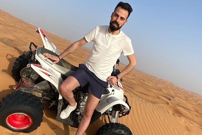 One Hour Quad Bike at Red Sand Desert Safari With Camel Ride and BBQ Dinner