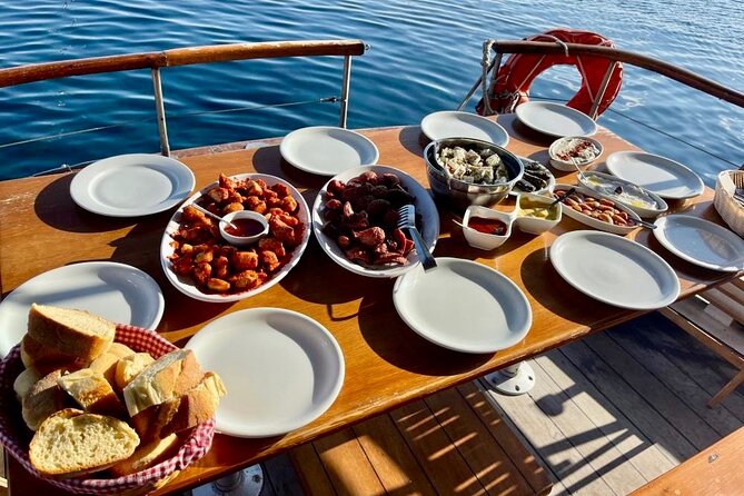 Santorini Caldera Day Traditional Cruise With Meal and Drinks - Swim and Snorkel at Red Beach