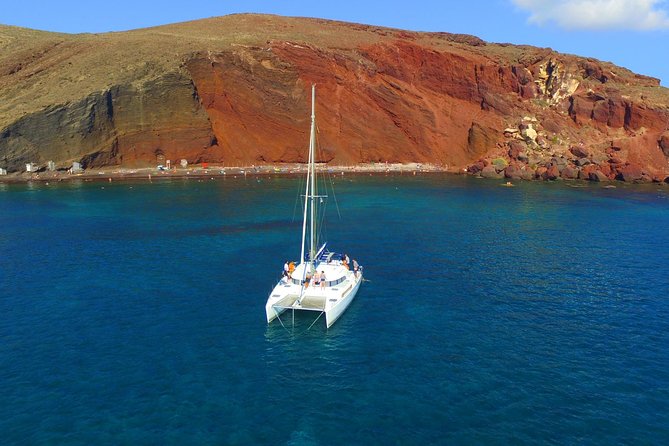 Santorini Full Day Catamaran Private Cruise Incl. Meal, Drinks & Free Transport Cruise Highlights