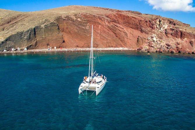 Santorini Half Day Catamaran Private Cruise Incl. Meal, Drinks & Free Transport - Pickup Times and Logistics