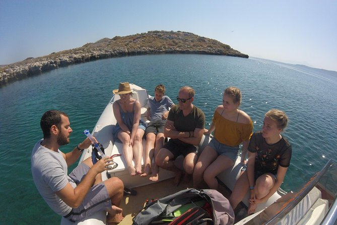 Boat Trip With Guided Snorkeling Tour & SUP in Chania - Snorkel Through Underwater Reefs and Caves