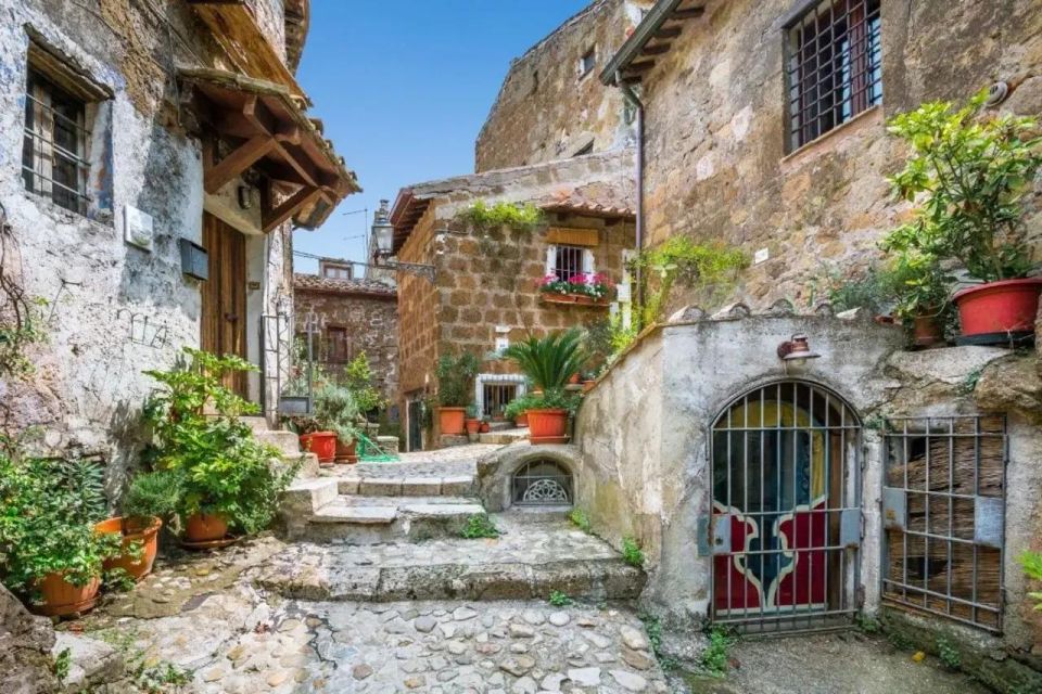 Day Trip to Calcata and Montegelato Waterwalls From Rome - Discover Calcata Medieval Village