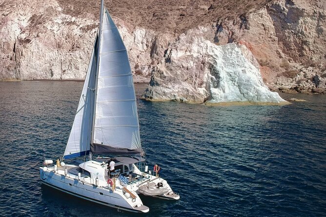 Infinity Blue Semi Private Sunset Cruise With Meal in Santorini - Meeting and Pickup