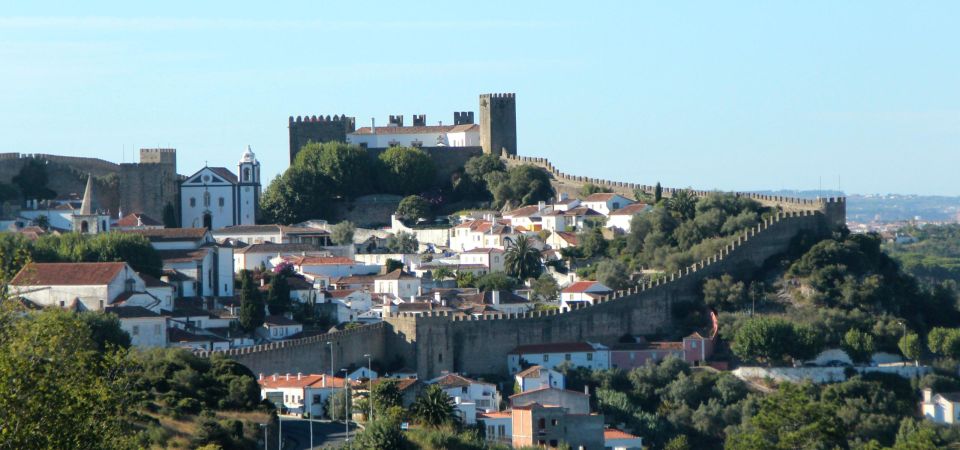 Lisbon to Porto Stop Óbidos, Nazaré, Fátima, Coimbra, Aveiro - Pickup and Drop-off