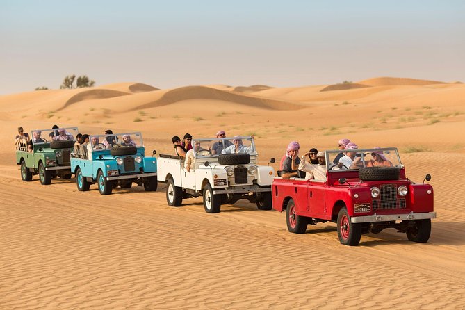 Overnight Desert Safari - Vintage Land Rovers & Traditional Activities - Camel Rides and Cuisine