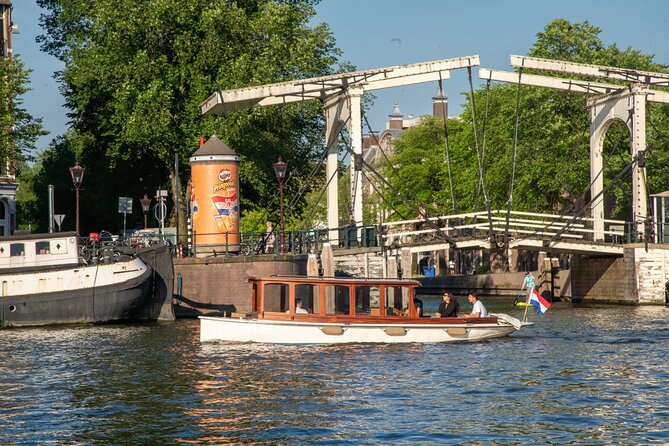 Private Boat Tour Amsterdam - 90 Min Incl. Welcome Drink on Historic Saloon Boat - Private Group Experience