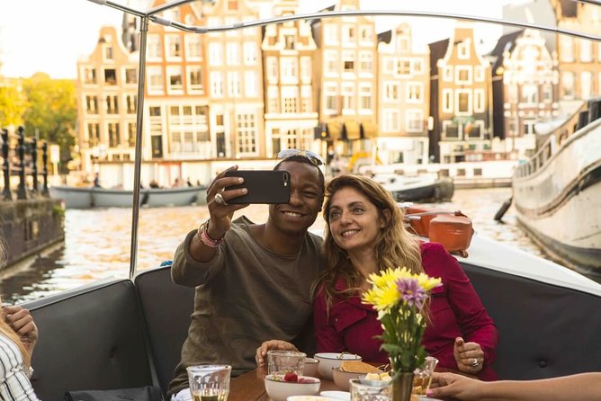 Private Romantic Canal Cruise Amsterdam With Bubbly and Snacks - Meeting and Pickup Location