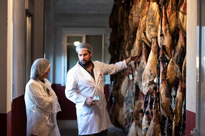 Private Visit to a Ham Factory With Show Cooking in Salamanca - Savoring the Gourmet Iberian Sausages