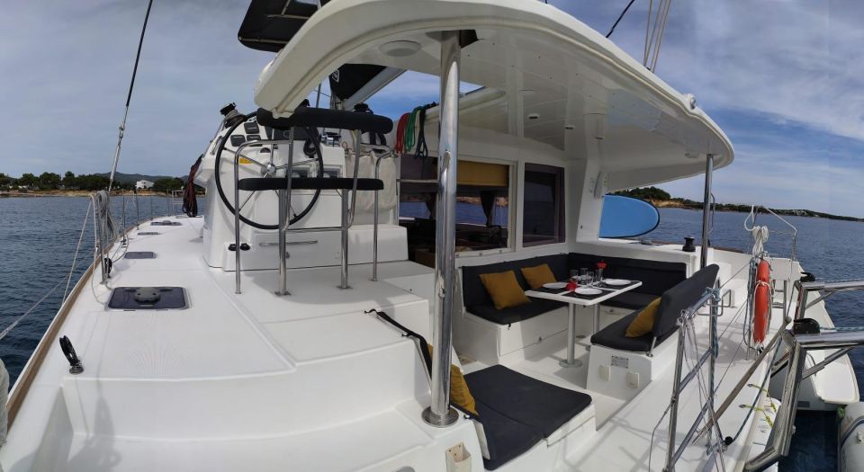 SAILING EXCURSION IN A PRIVATE CATAMARAN TO FORMENTERA - Diving Into Ses Illetes Crystal Waters