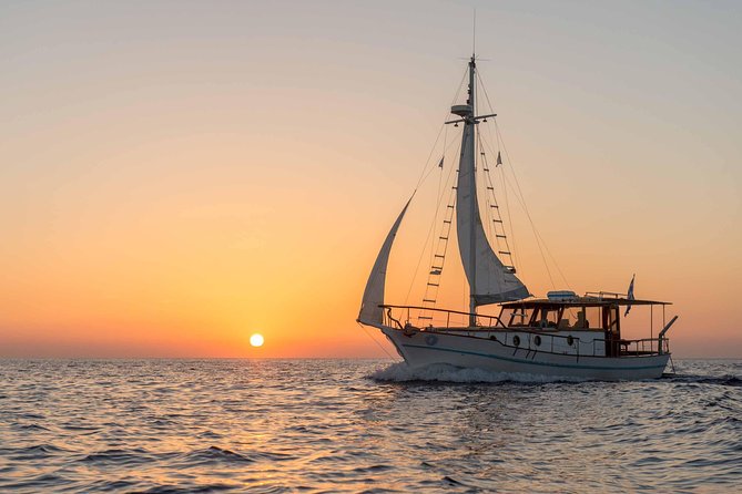 Santorini Caldera Sunset Traditional Cruise With Meal and Drinks - Stops and Activities