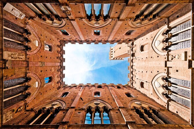 Small Group Pisa Day Trip to Siena and San Gimignano Including Wine Tasting - Duration and Meeting Point