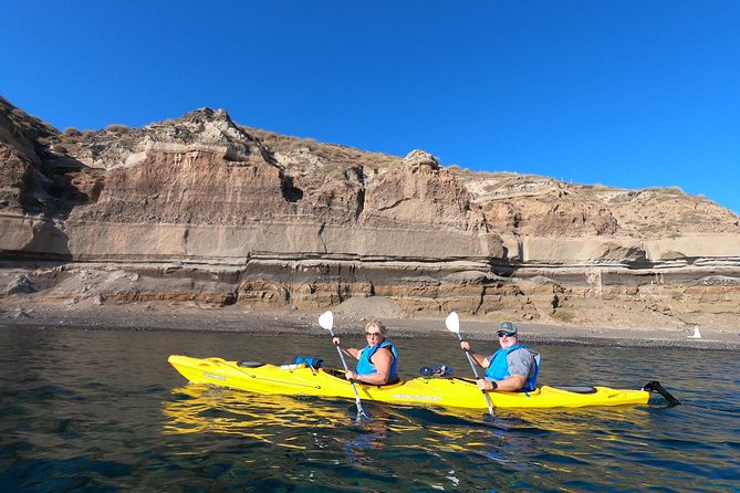 Small-Group Santorini Sea Caves Kayak Trip With Snorkeling & Picnic - Sea Caves, Coves, and Lava Formations