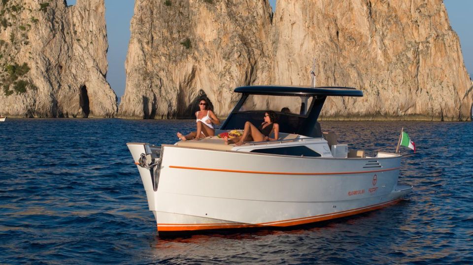 Sorrento: Private Tour to Capri on a  Gozzo Boat - Exploring Capris Coastline